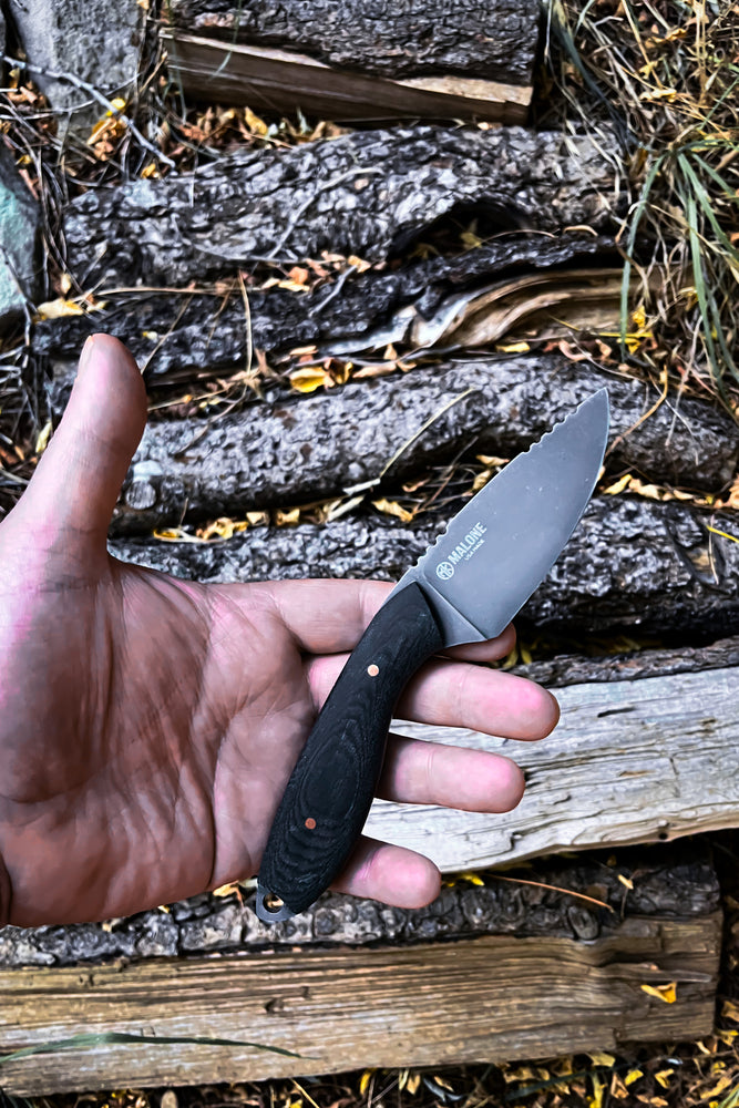 
                  
                    Skinning Knife (Black Micarta)
                  
                