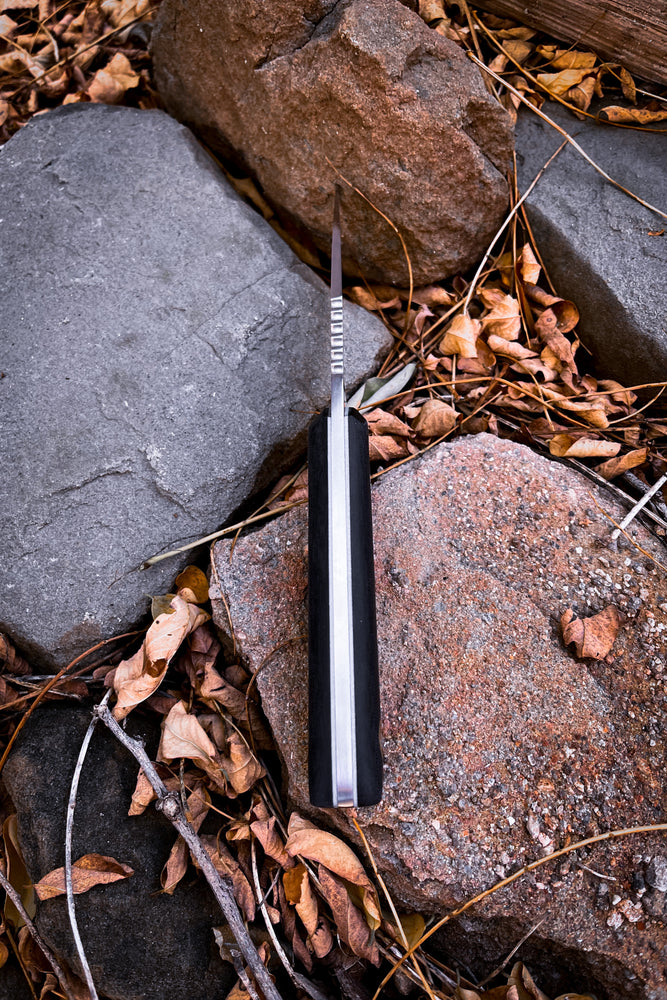 
                  
                    Skinning Knife (Black Micarta)
                  
                